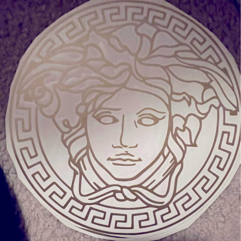 This is a decal. goes on glass wood ceramic or any other flat surface
